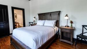 Postel nebo postele na pokoji v ubytování Hotel Giles