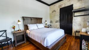 Postel nebo postele na pokoji v ubytování Hotel Giles