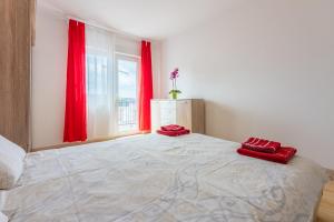 Posteľ alebo postele v izbe v ubytovaní Apartment Astrid