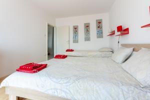 Posteľ alebo postele v izbe v ubytovaní Apartment Astrid