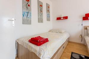 Posteľ alebo postele v izbe v ubytovaní Apartment Astrid