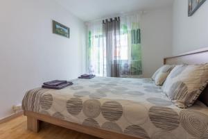 Posteľ alebo postele v izbe v ubytovaní Apartment Astrid