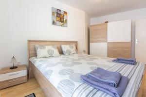Posteľ alebo postele v izbe v ubytovaní Apartment Astrid