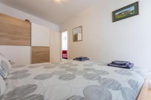 Posteľ alebo postele v izbe v ubytovaní Apartment Astrid