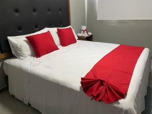 Postel nebo postele na pokoji v ubytování HIT Merida Hotel Boutique