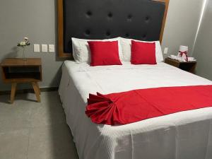 Postel nebo postele na pokoji v ubytování HIT Merida Hotel Boutique