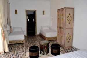 Riad Dar Hamid Hotel & Spa客房内的一张或多张床位