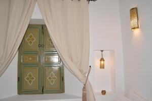Riad Dar Hamid Hotel & Spa客房内的一张或多张床位