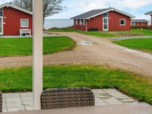 - une vue depuis la terrasse couverte d'une maison et d'une route dans l'établissement Holiday home Sydals LXVI, à Mommark