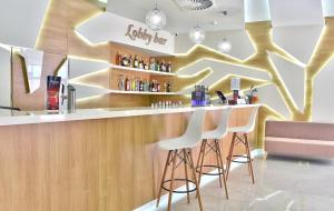 Ο χώρος του lounge ή του μπαρ στο GRIFID Hotel Foresta - All Inclusive & Free GRIFID Beach - Adults Only