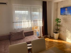 Khu vực ghế ngồi tại Apartman Jana Apatin