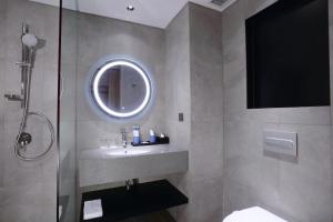 Koupelna v ubytování Grand Aston Puncak Hotel & Resort