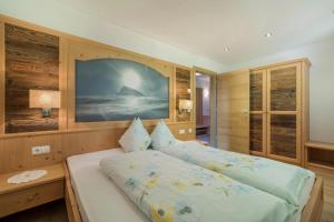 Llit o llits en una habitació de Fewo Sonnenaufgang - Zeppichl