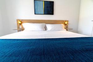 Aqua Apartments Bellamar, Marbella客房内的一张或多张床位