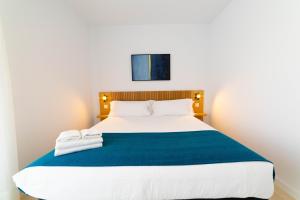Aqua Apartments Bellamar, Marbella客房内的一张或多张床位