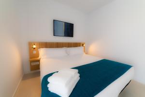 Aqua Apartments Bellamar, Marbella客房内的一张或多张床位