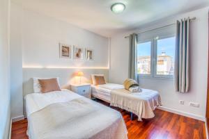 Posteľ alebo postele v izbe v ubytovaní Villa Playa Esperanza, Pool Heizung, 7 Gäste