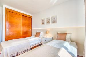 Posteľ alebo postele v izbe v ubytovaní Villa Playa Esperanza, Pool Heizung, 7 Gäste