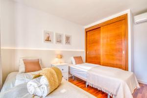 Posteľ alebo postele v izbe v ubytovaní Villa Playa Esperanza, Pool Heizung, 7 Gäste