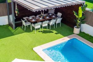 Bazén v ubytovaní Villa Playa Esperanza, Pool Heizung, 7 Gäste alebo v jeho blízkosti