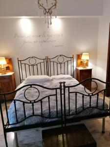 Ліжко або ліжка в номері La Dimora del Conte
