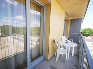 Un balcón o terraza de Gardino Apartment Druskininkai