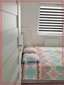 Postel nebo postele na pokoji v ubytování Apartament 2 pokoje w Gdańsku prywatny parking