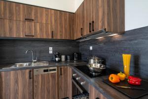 A kitchen or kitchenette at Horizon Ionian Villas