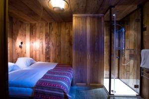 Postel nebo postele na pokoji v ubytování Chalet Z'Gogwärgji