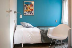 Tempat tidur dalam kamar di Jonkerstee 226 De Zee-egel Ouddorp - not for companies