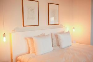 Voodi või voodid majutusasutuse Vesper Hotel toas