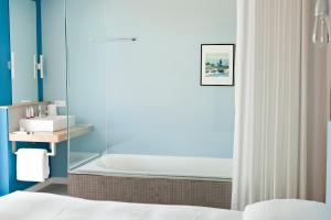 Voodi või voodid majutusasutuse Vesper Hotel toas