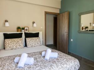 Posteľ alebo postele v izbe v ubytovaní PETRA RESIDENCES IN LINDOS