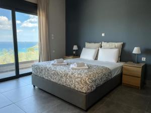 Posteľ alebo postele v izbe v ubytovaní PETRA RESIDENCES IN LINDOS