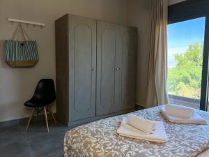 Posteľ alebo postele v izbe v ubytovaní PETRA RESIDENCES IN LINDOS