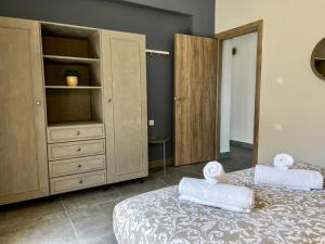 Posteľ alebo postele v izbe v ubytovaní PETRA RESIDENCES IN LINDOS