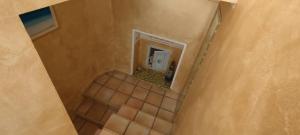 an overhead view of a bathroom with a mirror at B&B DaGiueli in Alassio