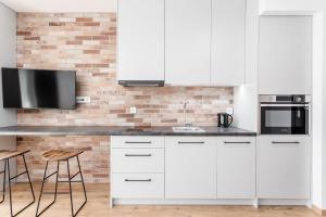 Kuchyň nebo kuchyňský kout v ubytování Rent like home - Dwie Motławy + 32 fotografií
