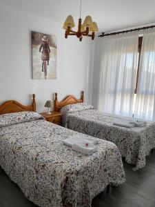 Postel nebo postele na pokoji v ubytování Convento de Foncebadon