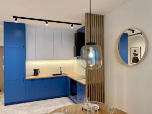 Posteľ alebo postele v izbe v ubytovaní Apartament Nautica Resort Q4Apartments
