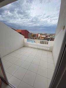 a balcony with a view of a city at Casa Relaxod in Santa Maria