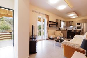 Kuchyň nebo kuchyňský kout v ubytování Planet Villas by Konnect - Shared BBQ & Garden + 14 fotografií