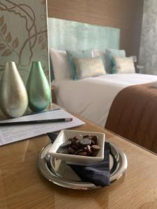 Кровать или кровати в номере Ramsey House - Luxury Licensed B&B - Parking and Guest Lounge