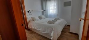 Postel nebo postele na pokoji v ubytování APARTAMENTO EN BARBATE