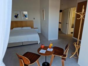 Postel nebo postele na pokoji v ubytování Y & P LATCHI HOTEL
