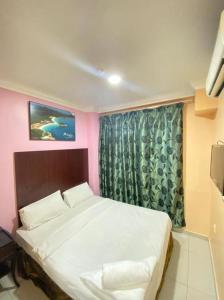 เตียงในห้องที่ GS Budget Hotel Ampang