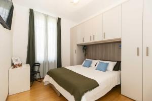 Posteľ alebo postele v izbe v ubytovaní Casa di Diana e Francesco in zona Cenisia by Wonderful Italy