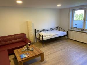 Postel nebo postele na pokoji v ubytování Schöne Wohnung mit Garten beim Outletcenter 5 km