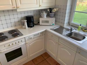 Køkken eller tekøkken på Friesenhof am Deich