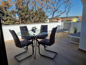 Balkón alebo terasa v ubytovaní Apartments Amfa